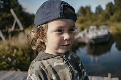 Smiling boy looking away