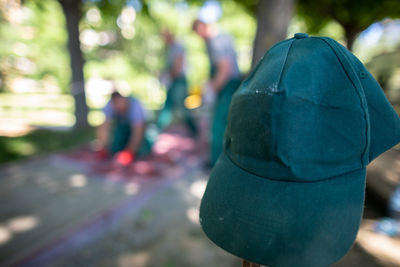 Close-up of person wearing hat