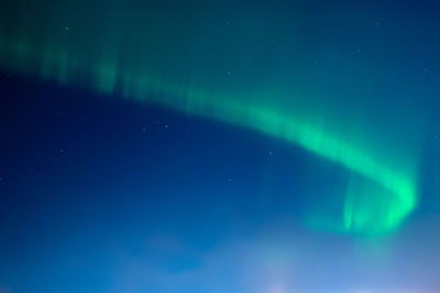 Low angle view of sea against sky at night