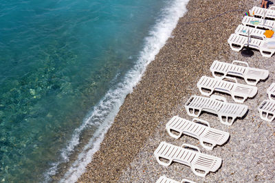 High angle view of chair on beach