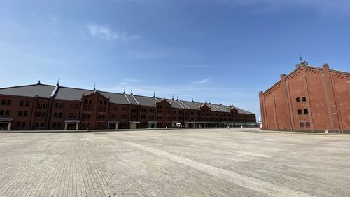 Buildings in city against sky