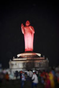 Low angle view of statue at night