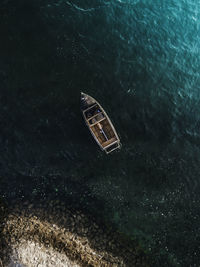 High angle view of abandoned floating on sea