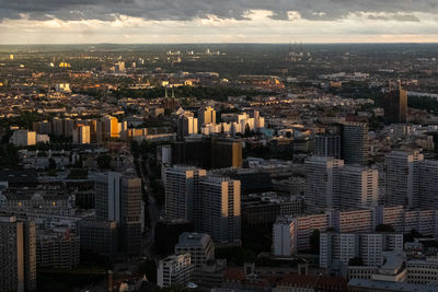 High angle view of modern buildings in city against sky