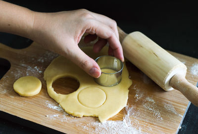 Midsection of person preparing food