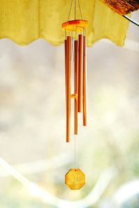 Low angle view of clothes hanging on yellow