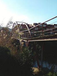 Low angle view of bridge against clear sky