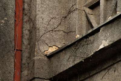 High angle view of rusty metal on wall
