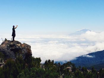 Man standing on cliff