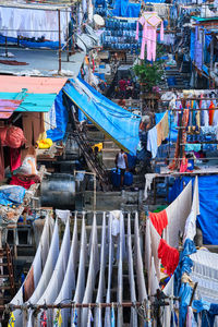 Clothes drying at market stall