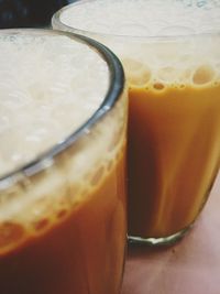 Close-up of beer in glass on table
