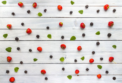 High angle view of fruits on wooden board