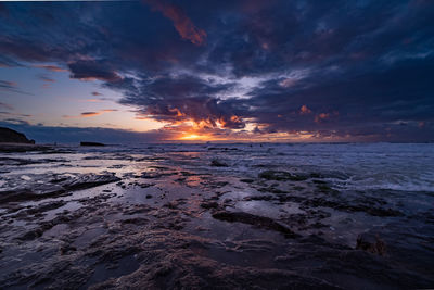 Scenic view of sea against sky during sunset