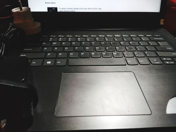 High angle view of computer keyboard on table