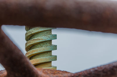 Close-up of hand holding glass stack