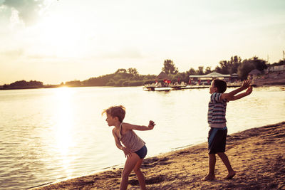 Boys playing at beach