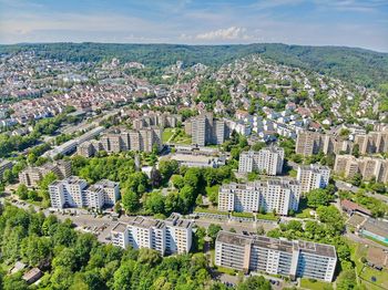 High angle view of buildings in city against sky