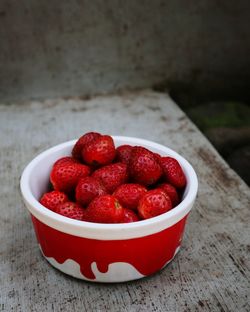 Close-up of strawberries in bowl on table