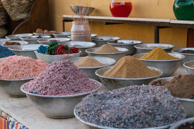 Colorful containers of different spices and herbs in egypt.
