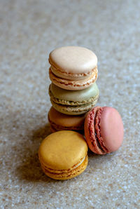 Delicious stack of french macarons in pastel colors and sweet flavors