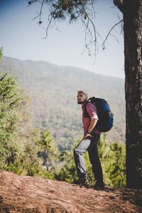 Man on field against sky