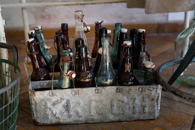 Close-up of old bottles on table