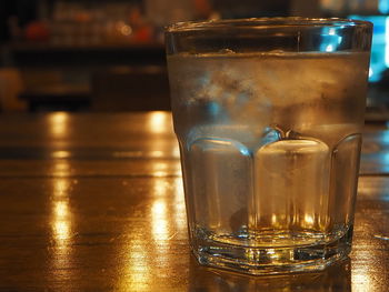 Close-up of beer glass on table