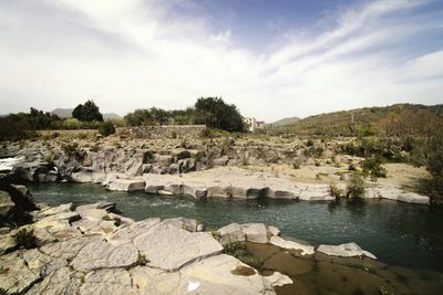 Scenic view of river against sky