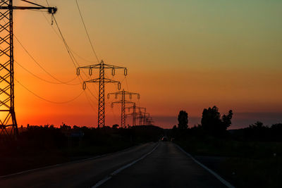 Low angle view of silhouette trees against sky during sunset