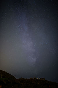 Low angle view of stars in sky at night