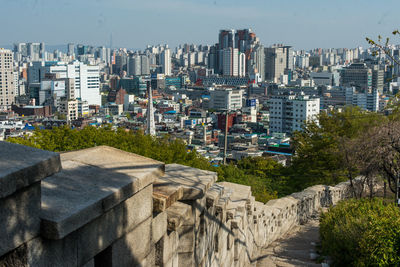 High angle view of buildings against clear sky