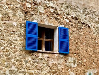 Blue window on wall