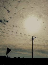 Silhouette bird against sky during sunset