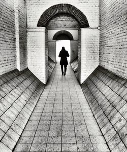 Full length of people walking in shopping mall