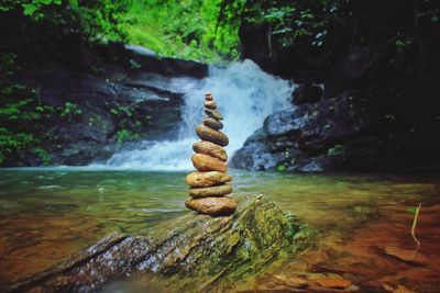 Stack of rocks at river 