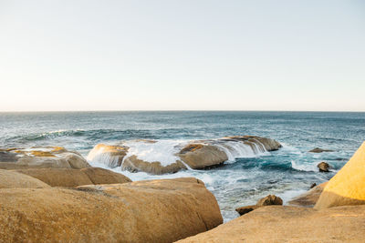 Scenic view of sea against clear sky