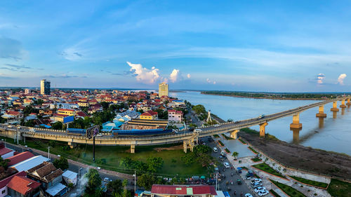 High angle view of buildings in city against sky