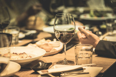 Glass of wine glasses on table at restaurant