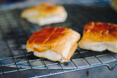 Close-up of bread on barbecue grill