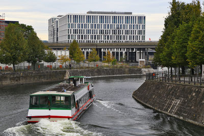 Touristic tour boat on spree river, berlin, germany