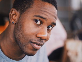 Close-up portrait of smiling young man