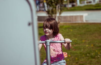 Small girl playing on the playground