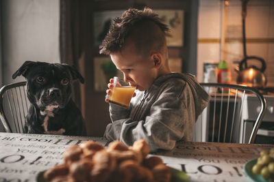 Portrait of boy with camera