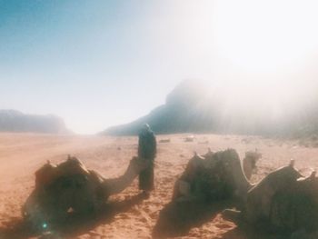 Shadow of man on sand