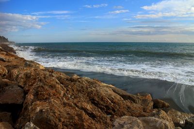 Scenic view of beach against sky