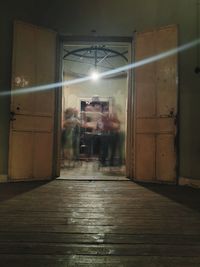 Illuminated corridor of building