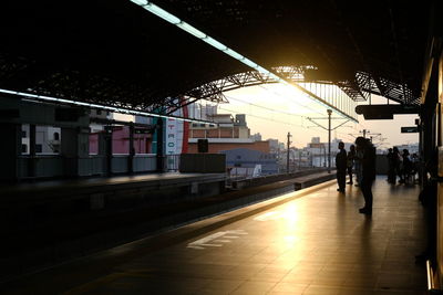 People at railroad station