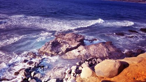 Waves splashing on rocks