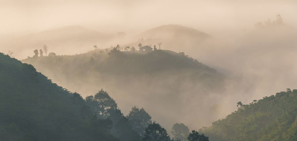 Scenic view of hills against sky during sunrise in bao loc town, lam dong province, vietnam