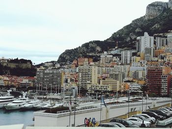 Buildings in city against sky